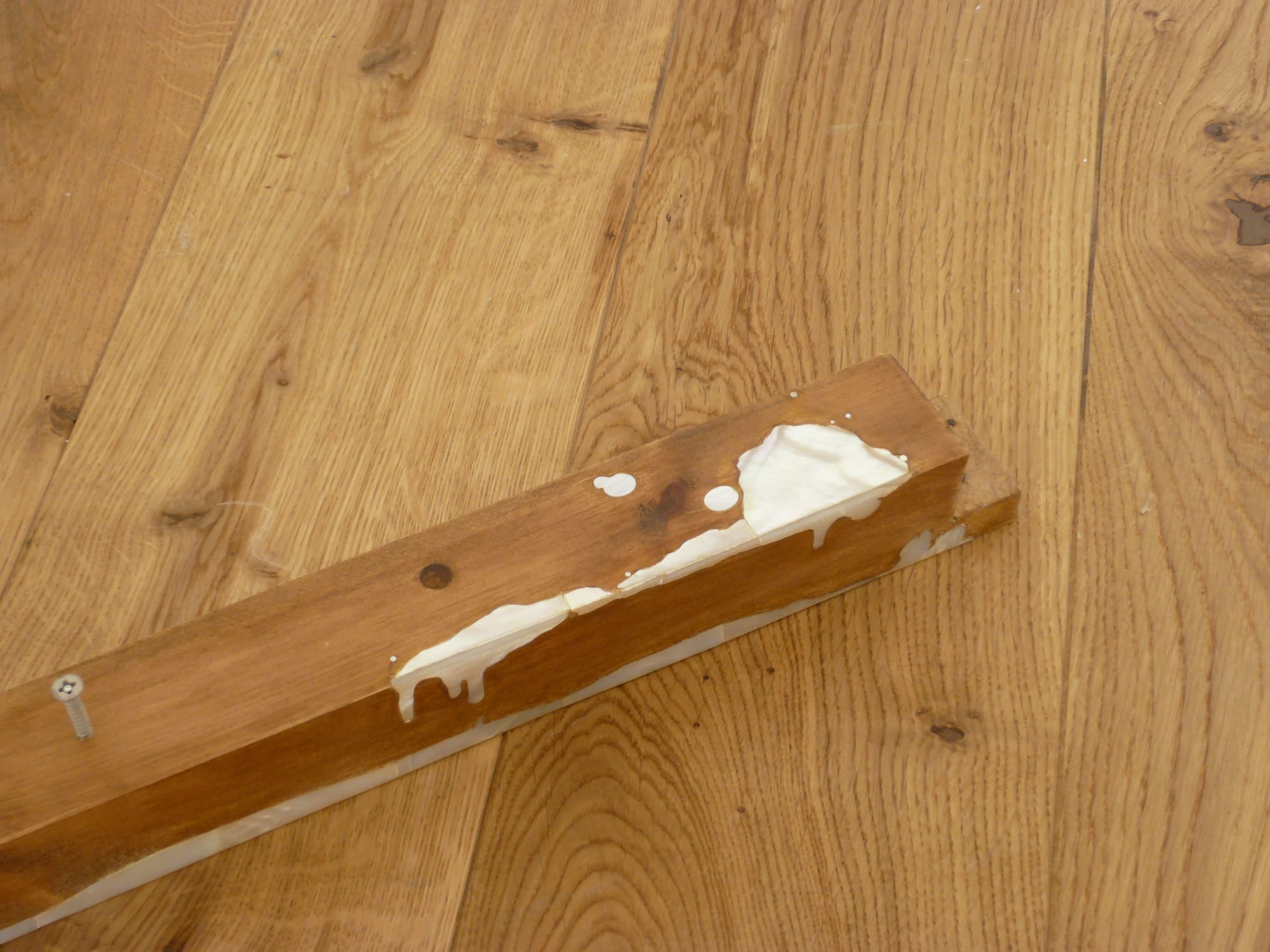 Falls from Grace (detail) 2008 wooden block, mother of pearl, 18 carat white gold, diamond, amber, smoky topaz